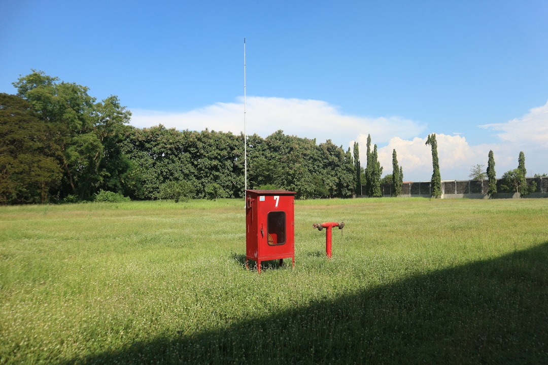 Tall buildings against a bright blue sky.