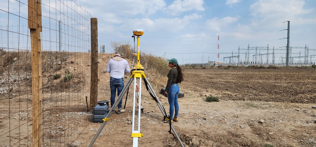 Three smiling friends with arms around each other