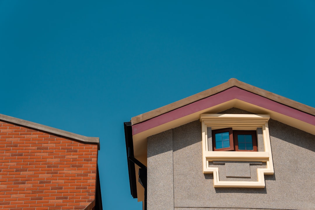 a group of colorful umbrellas hanging from a building