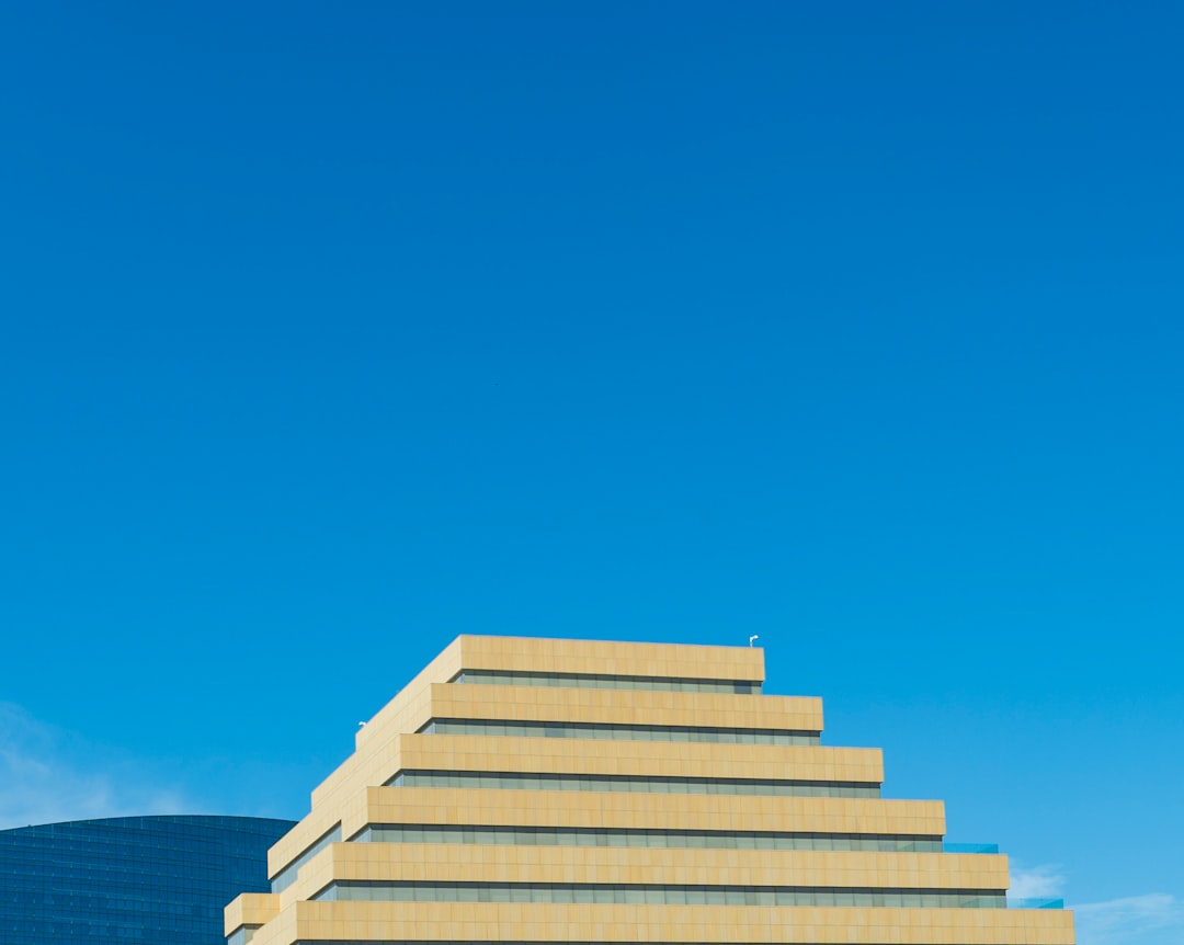 Modern apartment building with balconies and glass windows