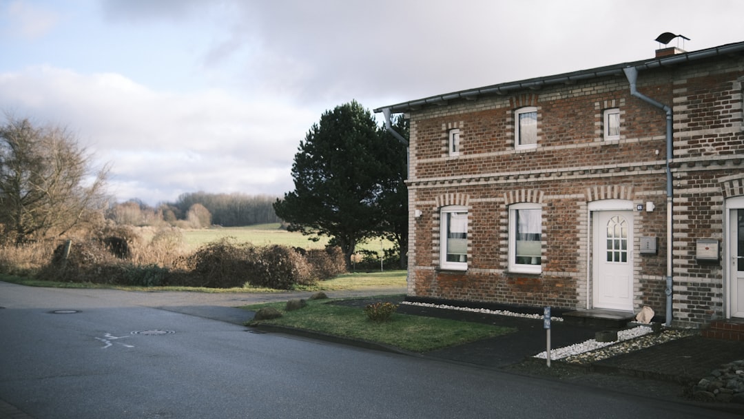 Tall buildings and lush green trees in a city
