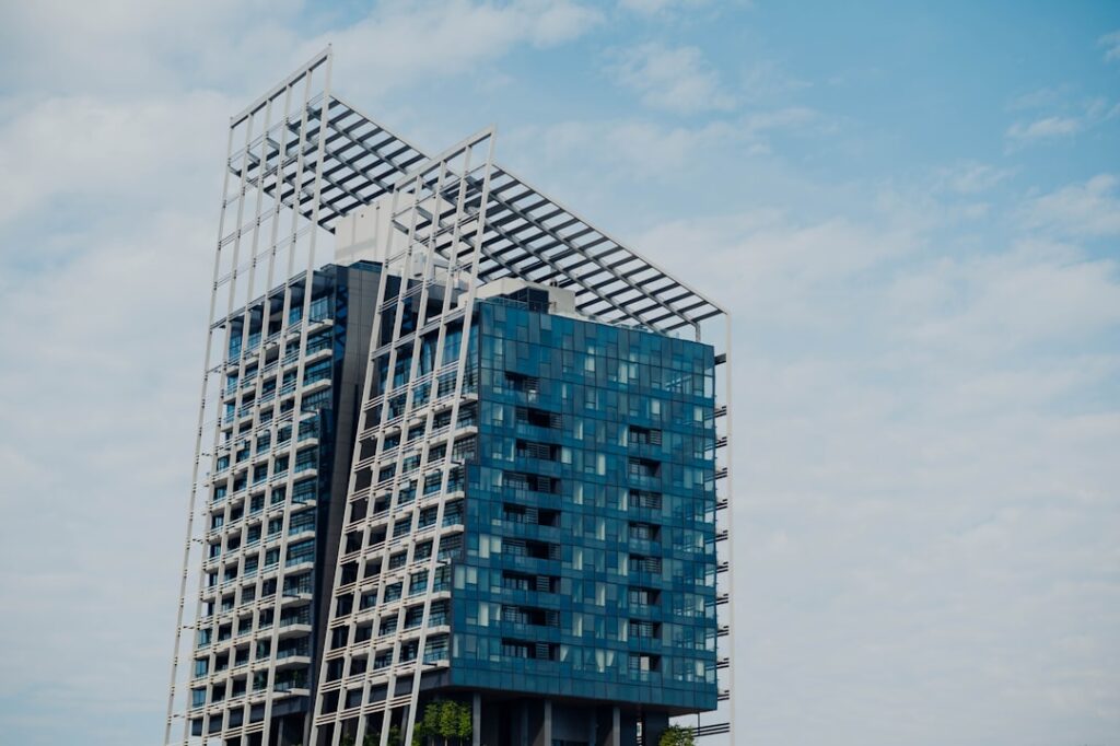 Modern building with cars parked underneath