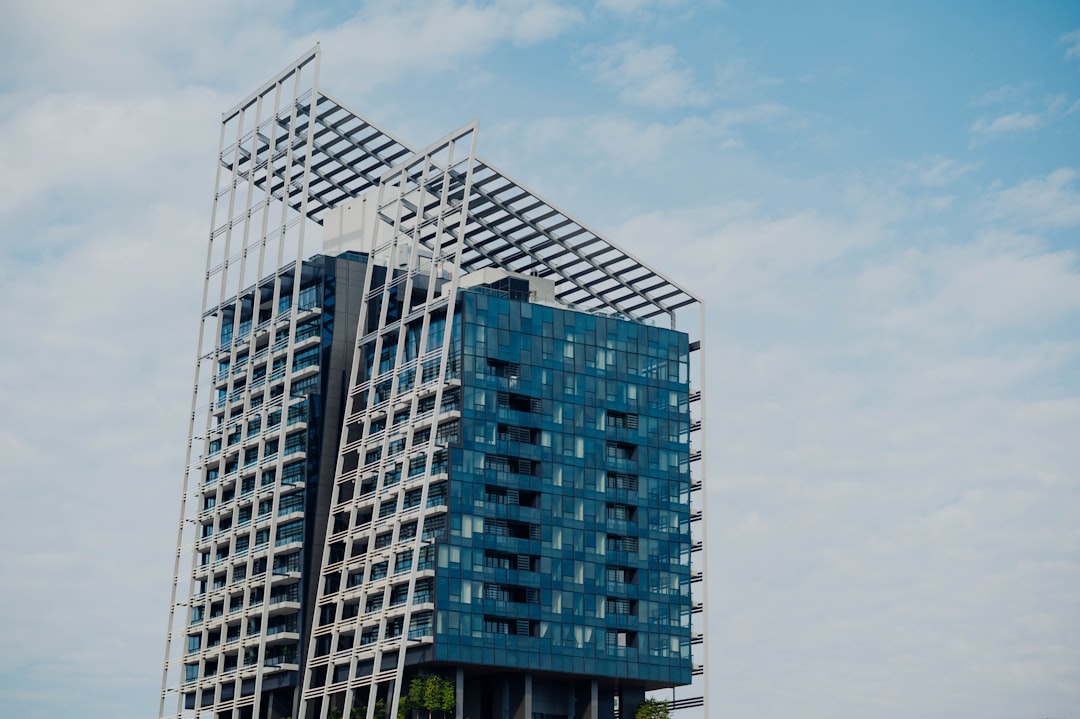 Modern building with cars parked underneath
