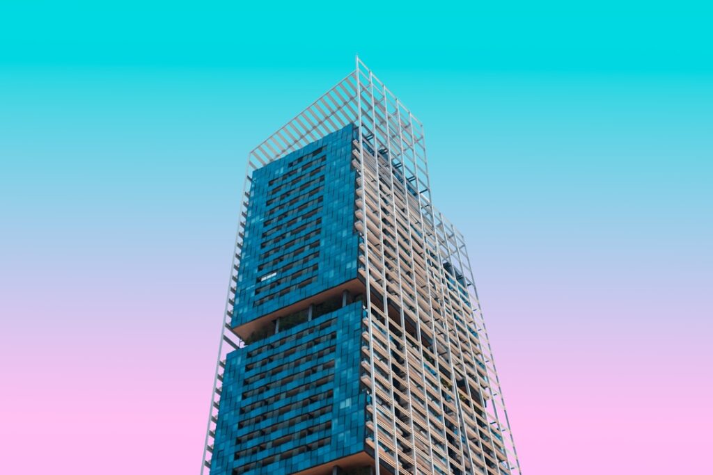 Rows of windows on a brick building facade.