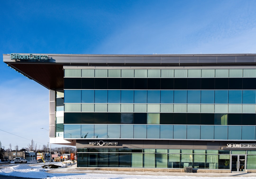 Modern building with curved windows against sky