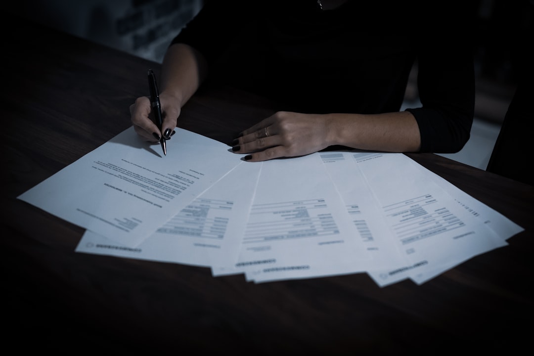 都市計画・開発申請書類のイメージ real estate legal document contract papers desk